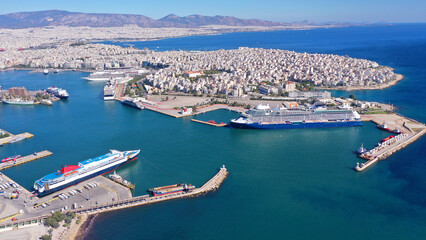 Wall Mural - Aerial drone photo of famous and busy port of Piraeus where passenger ferries travel to Aegean destination islands, Attica, Greece