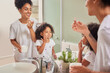 © Alexis Scholtz/peopleimages.com - Family, skincare and love with mom and girl with facial product in bathroom mirror together for beauty, cosmetics or luxury. Wellness, happy and morning with Brazil mother and child with face cream