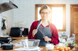 © vacancylizm - Beautiful young woman  is mixing batter, looking at camera and smiling while baking in kitchen at home ,decorating a cake of chocolate cake,cooking class, culinary, bakery, food and people concept