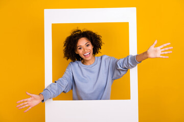 Wall Mural - Portrait of attractive excited person raise hands welcome you embrace isolated on yellow color background