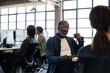 © ReeldealHD images - African American businessman listening in a meeting