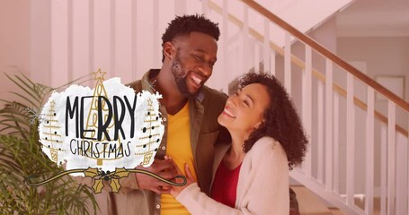 Sticker - Animation of merry christmas text over african american couple smiling