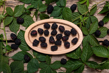 Wall Mural - Blackberries on a old wooden table