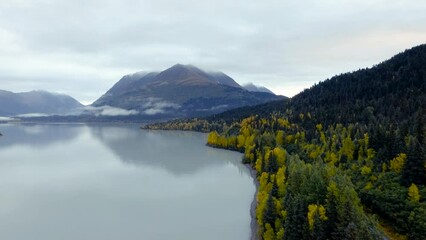 Poster - Cloudy morning at Upper Trail lake in the Alaskan mountains during fall season.