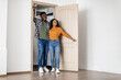 © Prostock-studio - Black Spouses Hugging Posing In Opened Door Of New House