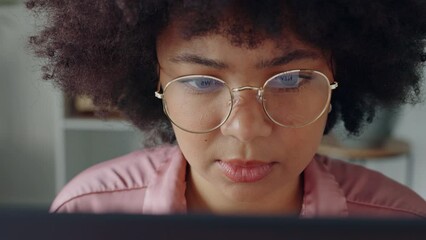 Fototapete - Laptop business, reading email and woman writing a proposal on the internet, thinking of idea for company and working on the web in office. Face of African receptionist typing online on computer