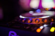 Close up of DJ console during party concert, music, electronic music, rave