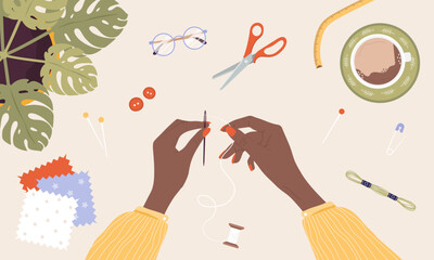 Wall Mural - African female hands insert thread into needle. Woman create outfit. Top view. Needlework and hobbies. Handmade clothes. Fashion designer or dressmaker. Vector illustration in flat cartoon style.