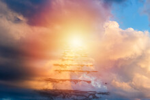 Beautiful Religious Background.Sunset Or Sunrise With Clouds,stairs To Heaven,bright Light From Heaven,stairway Leading Up To Skies Clouds.Light From Sky.Religion Concept.Blurred Soft Image.