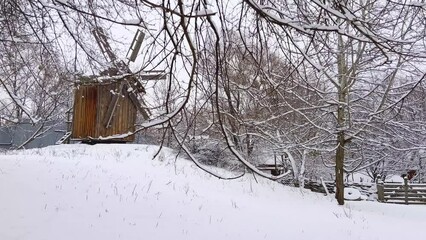 Sticker - The windmill on snowy hill, Mamajeva Sloboda Cossack Village, Kyiv, Ukraine