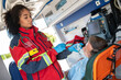 © zinkevych - Ambulance doctor preparing a respiratory patient for oxygen therapy
