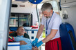 © zinkevych - Patient receiving emergency medical care in the ambulance car