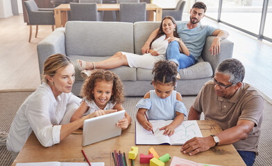 Wall Mural - Family, education and grandparents helping kids with development learning schoolwork in drawing book and tablet. Old man and elderly woman teaching children with mother and dad relaxing on home couch