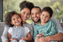 Smile, Portrait And Happy Family Love To Relax Together In A Positive Home On A Fun Weekend For Bonding. Happiness, Mother And Father Smiling With Young Latino Kids Or Children Enjoying Quality Time