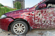 Damaged and destroyed civilian car with shrapnel holes from Russian missile in a war zone in Kharkiv, Ukraine