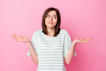 Sticker - Photo portrait of gorgeous young lady look empty space shrug shoulders unsure wear trendy striped clothes isolated on pink color background