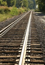 Vertical Shot Of Long Rusty Train Tracks Near McIntyer Park In Missouri