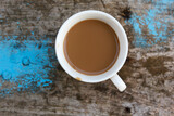 Fototapeta Mapy - Coffee cup on wooden background