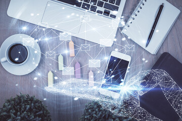 Poster - Multi exposure of envelop technology theme drawing over table with phone. Top view. Concept of electronic mail.
