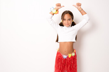 little child girl in hawaiian costume standing making heart figure isolated white background