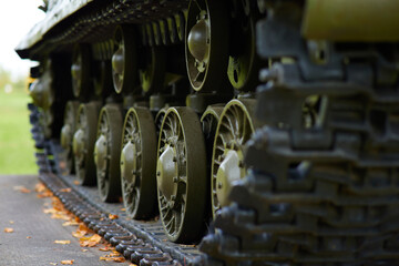 Caterpillars of a military tank close up detail
