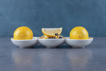 Wall Mural - close up photo of fresh organic lemons