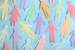 © New Africa - Many different paper human figures on light blue background, flat lay. Diversity and inclusion concept