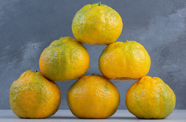 Wall Mural - Fresh organic tangerine row . Fruit concept