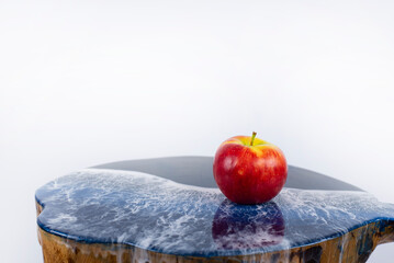 Wall Mural - Wooden table with epoxy resin. Table
  sea. Designer furniture. Red Apple