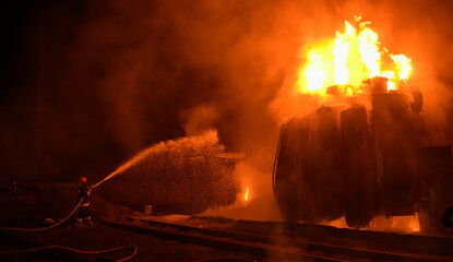 Wall Mural - Fire at a transformer substation after being hit by a missile 