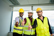© sirichai - A team of happy engineers diverse shows thumbs up together looking at the camera to celebrate the victory successful architectural project, unity, teamwork, architecture, construction concept