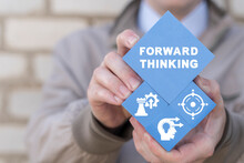 Forward Thinking Business Concept. Businessman Holding Blue Styrofoam Blocks With Icons And Inscription: FORWARD THINKING.