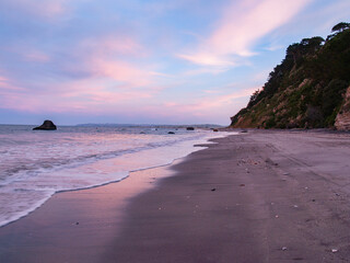 Wall Mural - Sunset colours reflected on wet sand