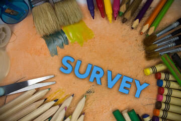 Poster - Overhead shot of school supplies with Survey text. Brushes, pencils, artistic tools. Art And Craft Work Tools.