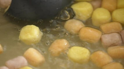 Wall Mural - Cooking traditional Taiwanese sweet dessert food taro ball at home.