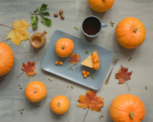 Wall Mural - Pumpkin pastry cheesecake and drink on the table