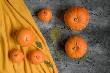 Orange pumpkins are on the table