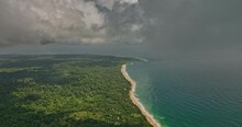 Bocas Del Toro Panama Aerial V8 Cinematic Flyover Capturing Bluff Beach, Turquoise Sea Water And Dense Lush Green Vegetation With Thick Tropical Clouds In The Sky - Shot With Mavic 3 Cine - April 2022