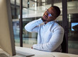© N Lawrenson/peopleimages.com - Burnout, stress and neck pain by businessman working on a computer late in office, injury and discomfort. Corporate employee suffering from hurt and tender spinal injury while working overtime