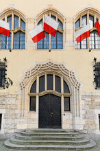 Vintage Facade And Polish Flags