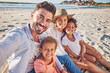 © Alexis Scholtz/peopleimages.com - Family, selfie and kids bonding on beach in trust, safety and security summer holiday by Mexico ocean or sea. Pov portrait, smile and happy parents with children or girls for social media photograph