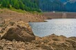 Closeup shot of the rocks on the shore of the Goldisthal pumped storage plant in Germany