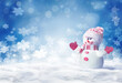 Merry christmas and happy new year greeting card. Happy snowman standing in winter christmas landscape.Snow background.