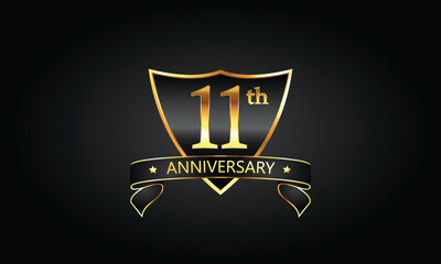 Wall Mural - 11 year anniversary logo with golden shield and ribbon. Dark concept anniversary. 11th Anniversary celebration background. eleventh anniversary banner vector