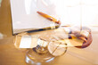 © ARMMY PICCA - Justice and law concept.Male judge in a courtroom with the gavel, working with, computer and docking keyboard, eyeglasses, on table in morning light