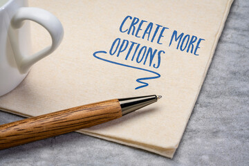 Poster - Create more options inspirational note. Motivational handwriting on a napkin with a cup of coffee. Business and personal development concept.