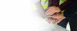 © KANGWANS - A team of engineers and investors go hand in hand. Businessmen and investors join hands with a team of engineers to start a real estate project. The concept was successful. Team work. Banner image.