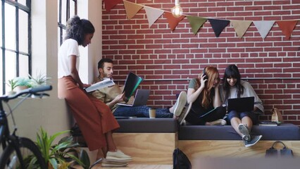 Leinwandbilder - Teamwork, design and planning with a creative woman and her male colleague working with documents in an office startup. Collaboration, strategy and graphic designer with a millennial group on a break