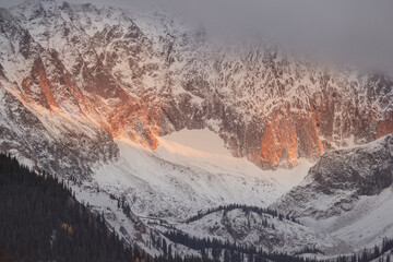 Wall Mural - USA, Colorado, White River National Forest. Sunset on snow-covered Capitol Peak mountain.