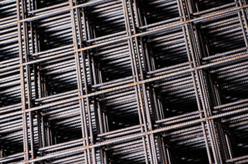 Stacked welded wire mesh in cold plant storehouse macro view